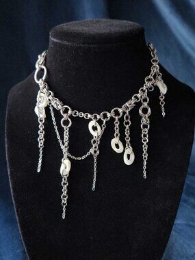 Mermaid's asymmetrical white pearl and silver chunky statement necklace